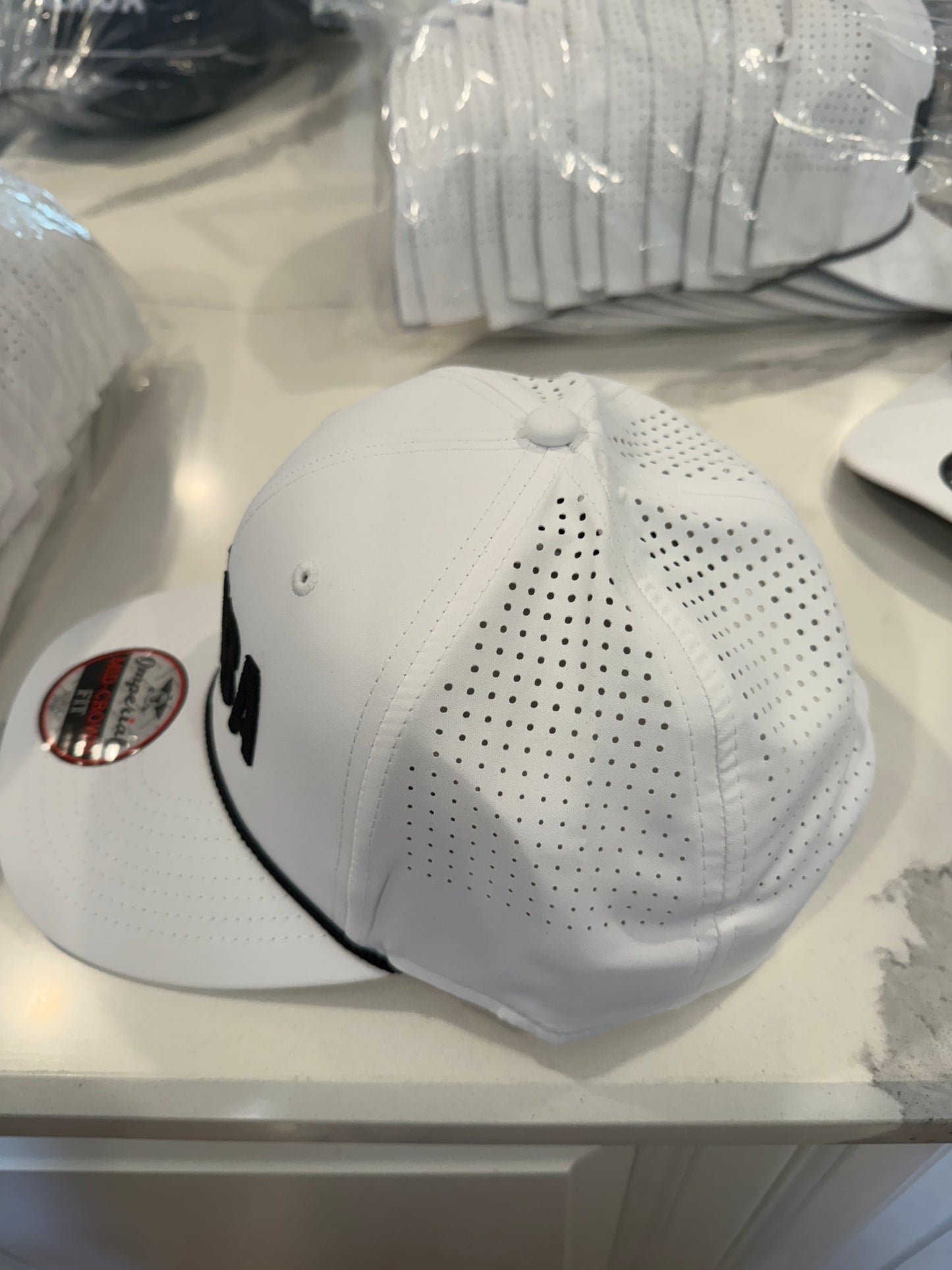 Yip Strickler MEMBA WHITE/BLACK Imperial 7054 Performance Hat